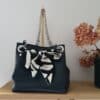 Sac seau en "cuir" de raisin de couleur bleu nuit